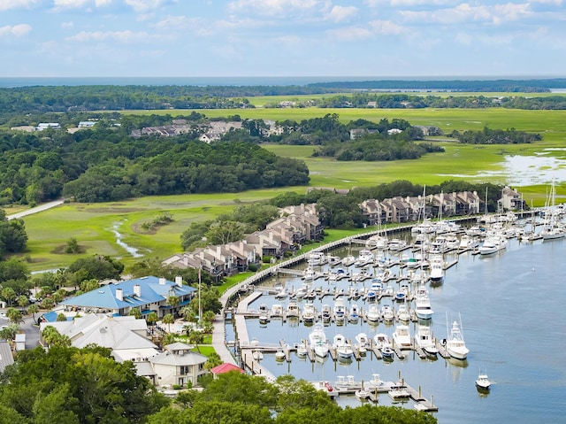 drone / aerial view featuring a water view and a residential view