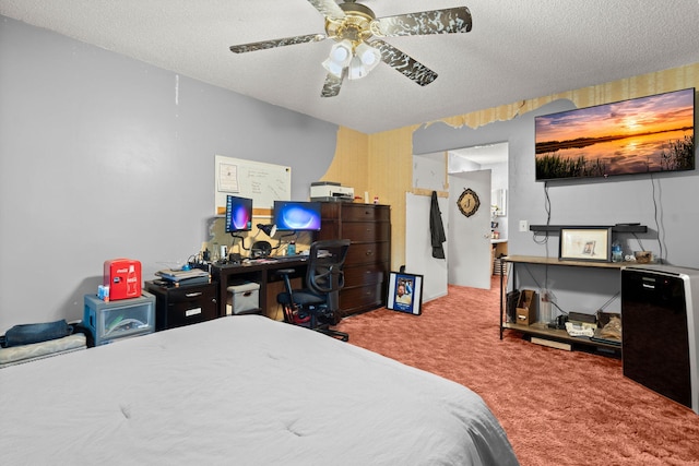 bedroom featuring a textured ceiling, carpet, and ceiling fan