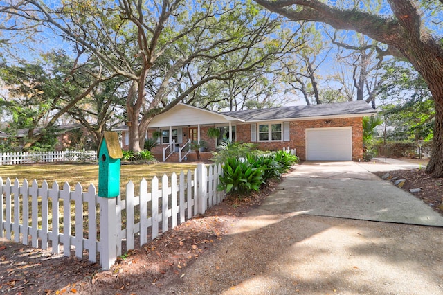 view of front facade with a garage and a porch