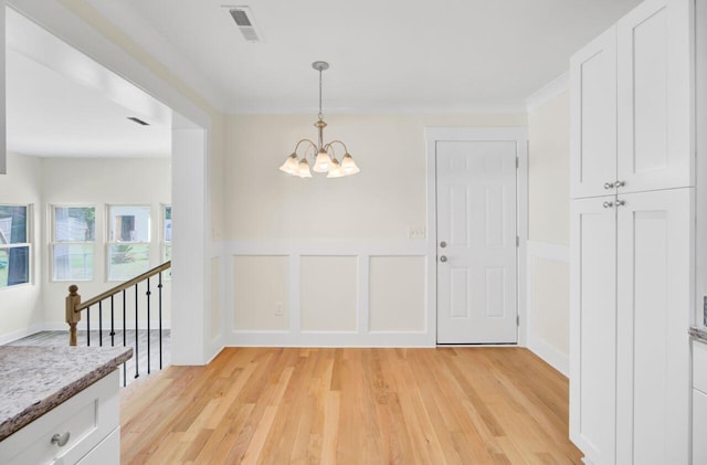 8612 Delhi Rd, North Charleston, SC 29406 - unfurnished dining area with a chandelier and light wood finished floors