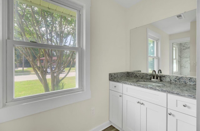 8612 Delhi Rd, North Charleston, SC 29406 - bathroom with vanity and baseboards