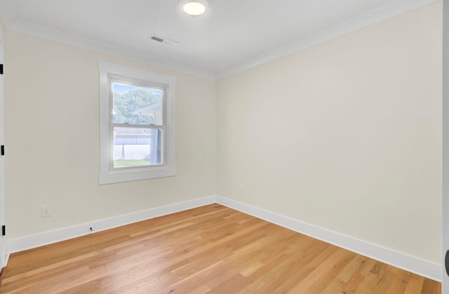 8612 Delhi Rd, North Charleston, SC 29406 - empty room featuring crown molding, baseboards, and light wood-style flooring