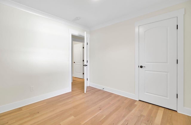 8612 Delhi Rd, North Charleston, SC 29406 - unfurnished bedroom with baseboards, light wood finished floors, and ornamental molding