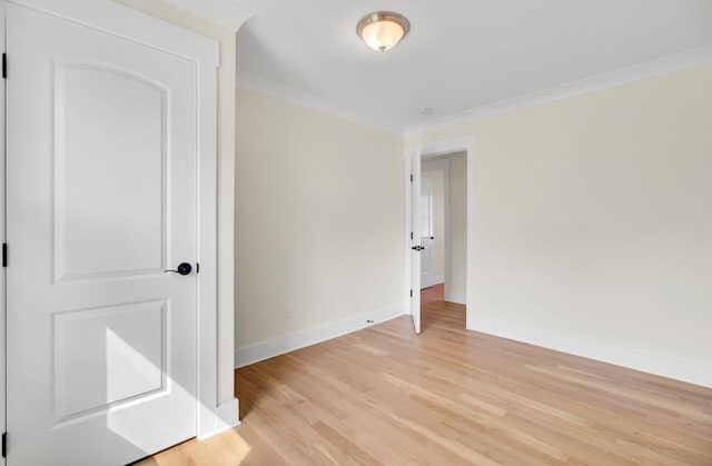 8612 Delhi Rd, North Charleston, SC 29406 - empty room with light wood finished floors, baseboards, and crown molding