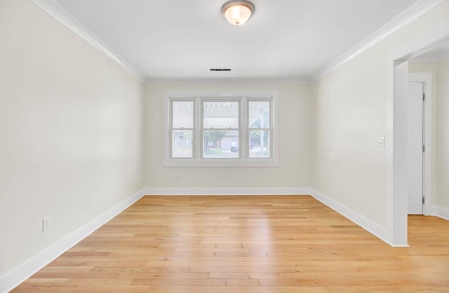 8612 Delhi Rd, North Charleston, SC 29406 - unfurnished room with crown molding, light wood finished floors, and baseboards