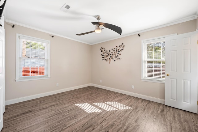 115 Clubhouse Rd, Summerville, SC 29483 - empty room with ornamental molding, visible vents, wood finished floors, and a healthy amount of sunlight