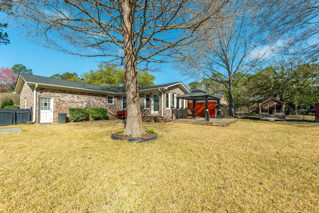 115 Clubhouse Rd, Summerville, SC 29483 - exterior space with brick siding, a front yard, a gazebo, and fence