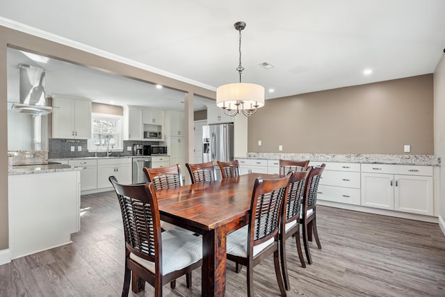 115 Clubhouse Rd, Summerville, SC 29483 - dining area featuring visible vents, light wood-style flooring, recessed lighting, and a chandelier