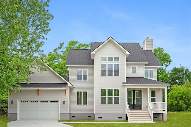 1076 Williams Rd, Charleston, SC 29412 - view of front of home featuring crawl space, covered porch, a front lawn, concrete driveway, and a garage