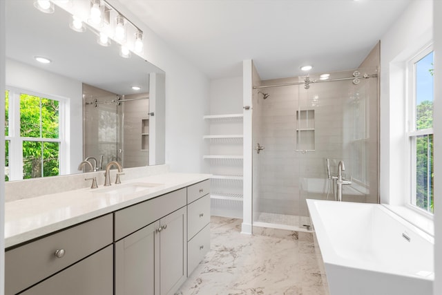 1076 Williams Rd, Charleston, SC 29412 - bathroom with a shower stall, a freestanding tub, vanity, marble finish flooring, and recessed lighting