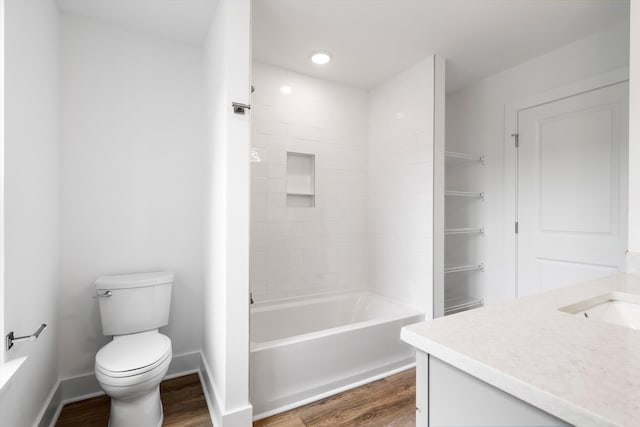 1076 Williams Rd, Charleston, SC 29412 - bathroom featuring wood finished floors, vanity, toilet,  shower combination, and recessed lighting