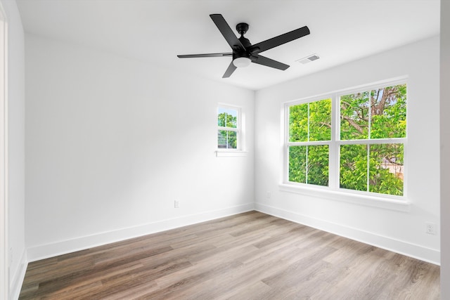 1076 Williams Rd, Charleston, SC 29412 - unfurnished room with baseboards, wood finished floors, and ceiling fan