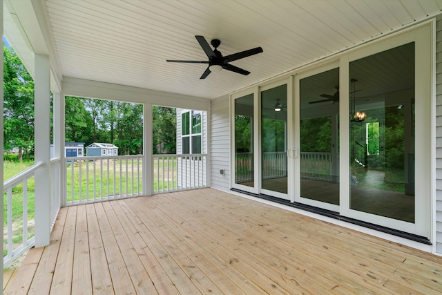 1076 Williams Rd, Charleston, SC 29412 - wooden deck with ceiling fan, an outbuilding, and french doors