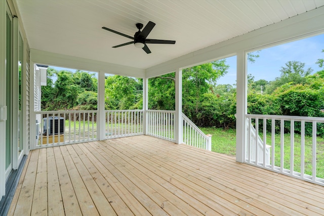 1076 Williams Rd, Charleston, SC 29412 - wooden terrace with ceiling fan, view of scattered trees, and central air condition unit