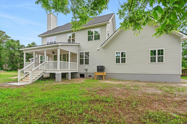 1076 Williams Rd, Charleston, SC 29412 - rear view of property featuring a ceiling fan, a porch, a chimney, a yard, and cooling unit