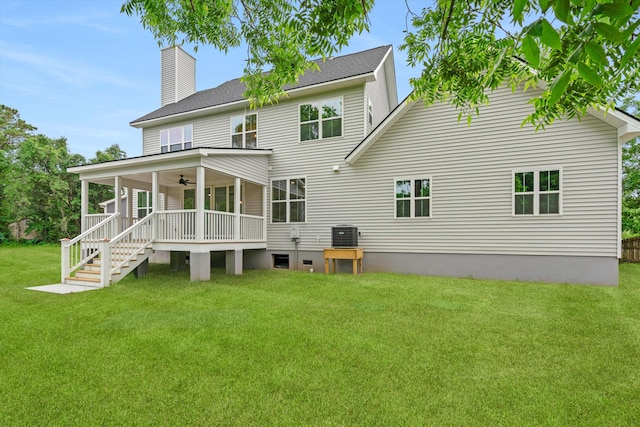 1076 Williams Rd, Charleston, SC 29412 - back of property with ceiling fan, a yard, a porch, a chimney, and cooling unit