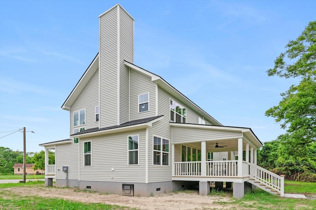 1076 Williams Rd, Charleston, SC 29412 - view of side of home featuring ceiling fan, a porch, a chimney, and crawl space