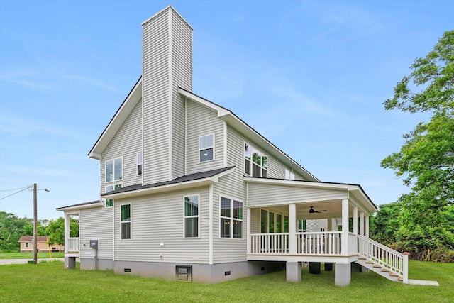 1076 Williams Rd, Charleston, SC 29412 - view of home's exterior featuring ceiling fan, a yard, crawl space, a chimney, and stairs