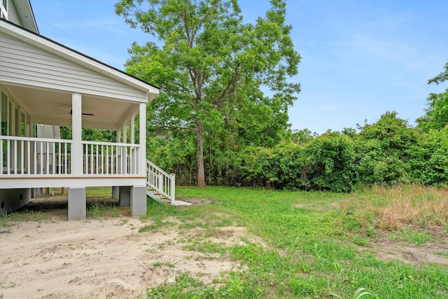 1076 Williams Rd, Charleston, SC 29412 - view of yard with a ceiling fan and stairway