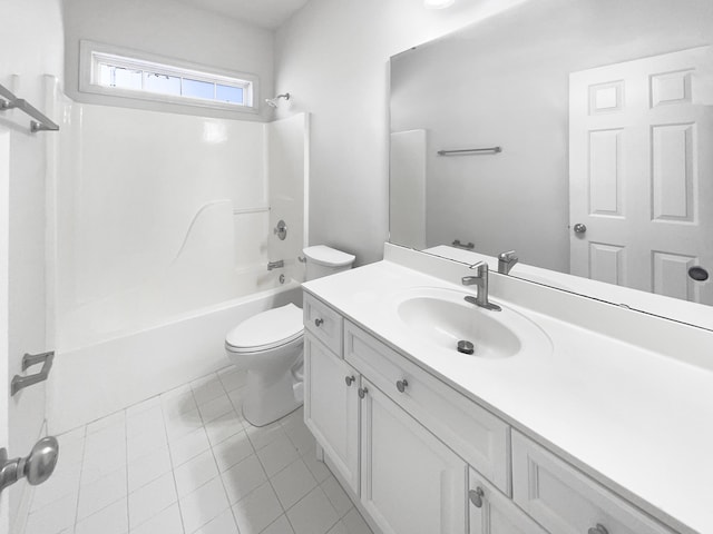 bathroom with toilet, vanity, and washtub / shower combination