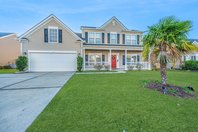 view of front of house with covered porch, a garage, and a front lawn