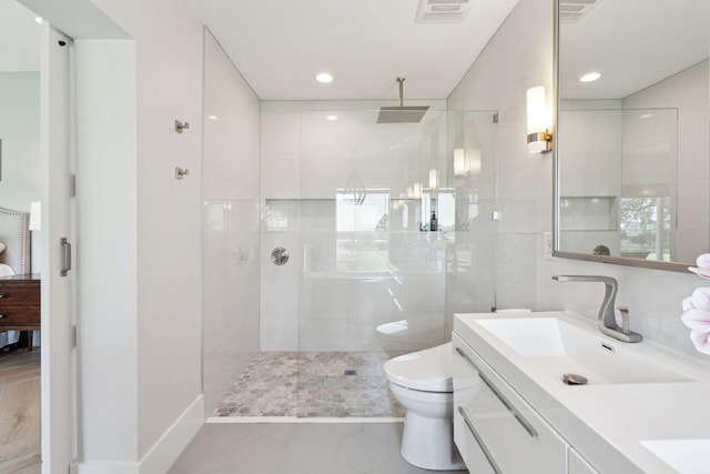 full bathroom with toilet, vanity, a walk in shower, tile patterned floors, and recessed lighting