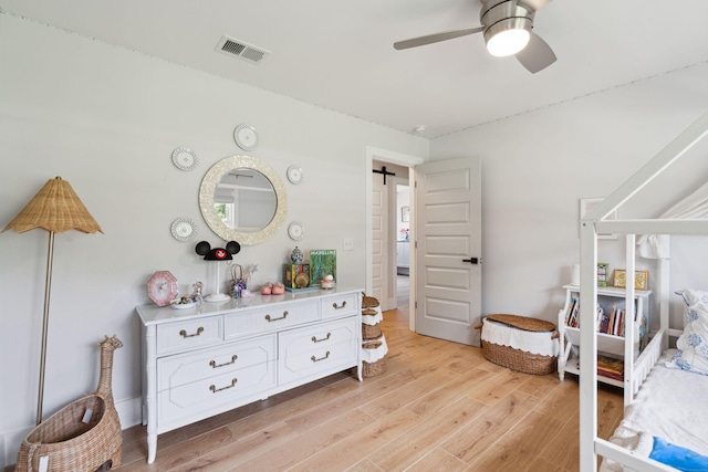 bedroom featuring light wood-style flooring