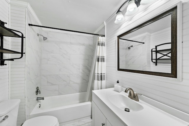 bathroom with marble finish floor, crown molding, toilet, shower / tub combo, and vanity