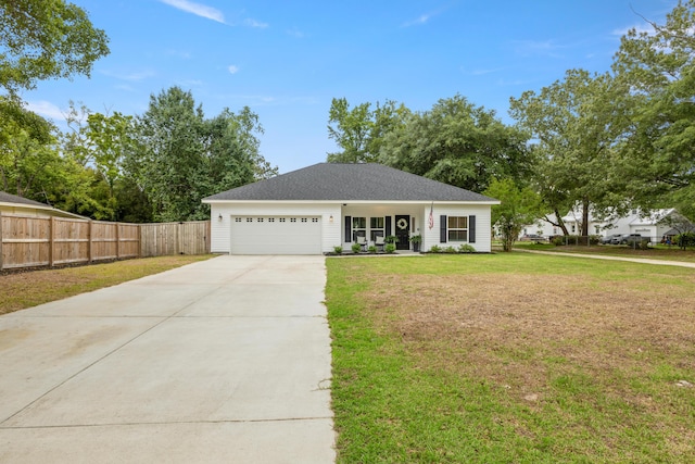 ranch-style house featuring concrete driveway and a garage
