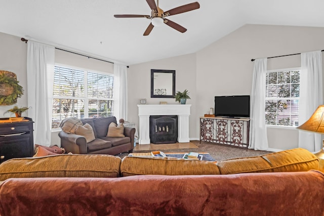 living room featuring lofted ceiling and ceiling fan