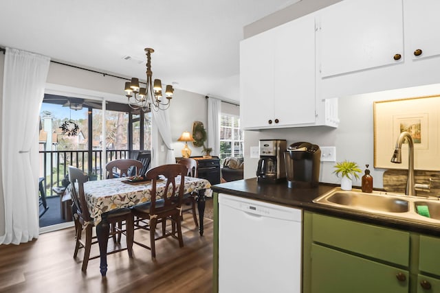 kitchen featuring sink, a chandelier, dark hardwood / wood-style floors, dishwasher, and white cabinets