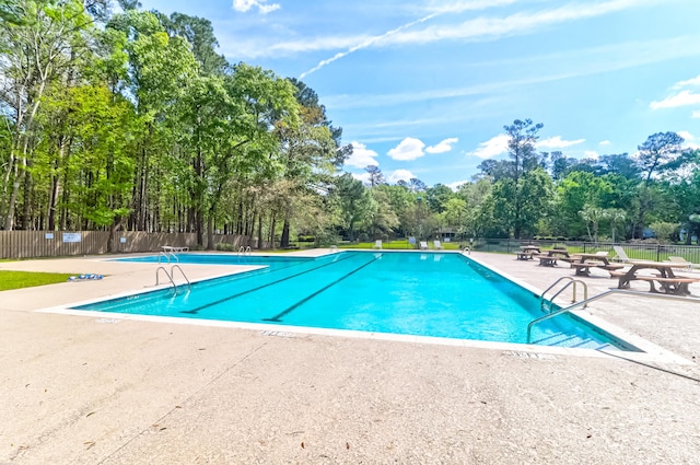 view of pool with a patio area