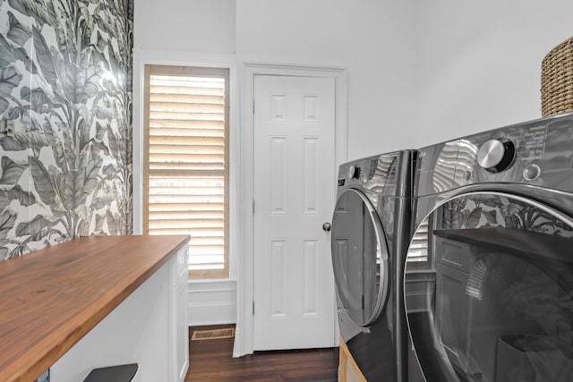 2128 Breezy Point Dr, Mount Pleasant, SC 29466 - laundry area with washing machine and clothes dryer and dark wood finished floors
