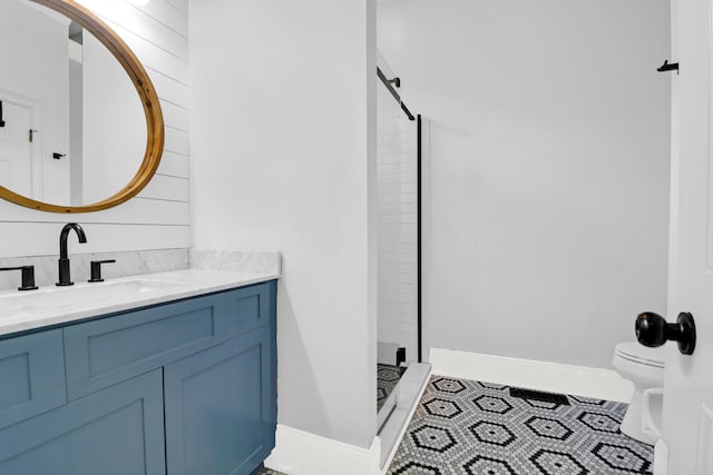 2128 Breezy Point Dr, Mount Pleasant, SC 29466 - full bath featuring toilet, a shower stall, vanity, tile patterned flooring, and baseboards