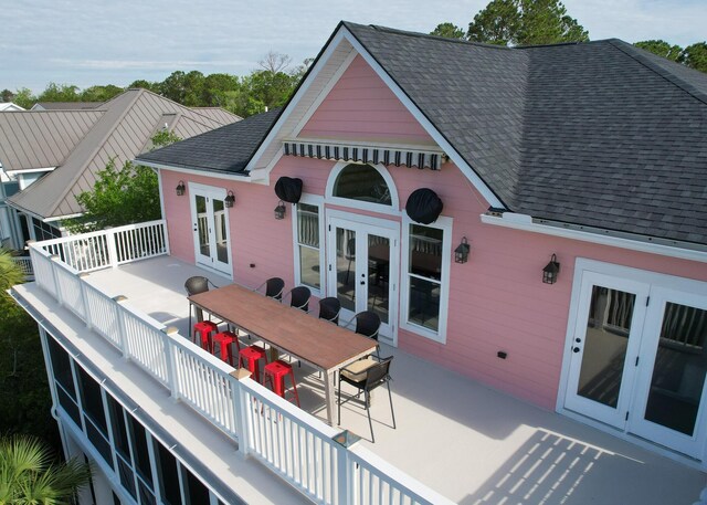 2128 Breezy Point Dr, Mount Pleasant, SC 29466 - back of property with french doors, a shingled roof, outdoor dining space, and a patio