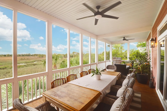 2128 Breezy Point Dr, Mount Pleasant, SC 29466 - sunroom with outdoor dining space, a ceiling fan, and wood finished floors