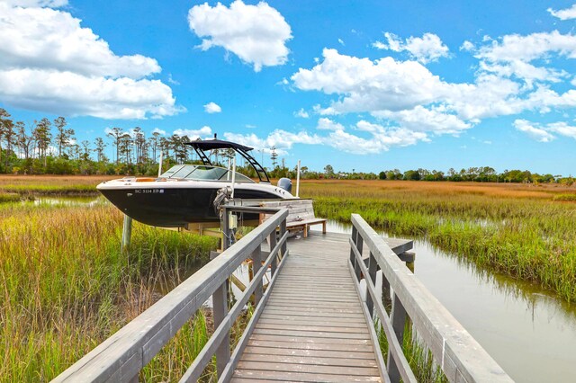 2128 Breezy Point Dr, Mount Pleasant, SC 29466 - dock area featuring boat lift and a water view