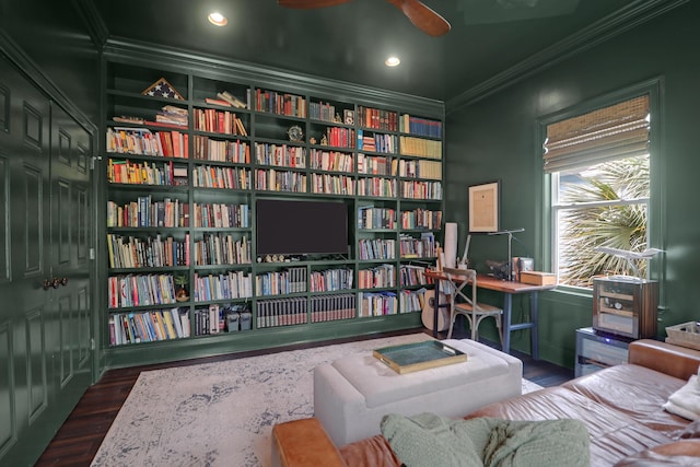 2128 Breezy Point Dr, Mount Pleasant, SC 29466 - living area with crown molding, wood finished floors, bookshelves, a ceiling fan, and recessed lighting