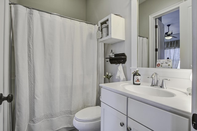 bathroom featuring ceiling fan, vanity, and toilet