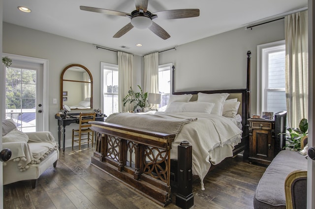 bedroom with dark wood-type flooring, access to outside, and ceiling fan