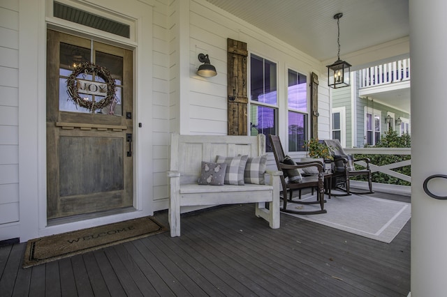 wooden deck featuring covered porch