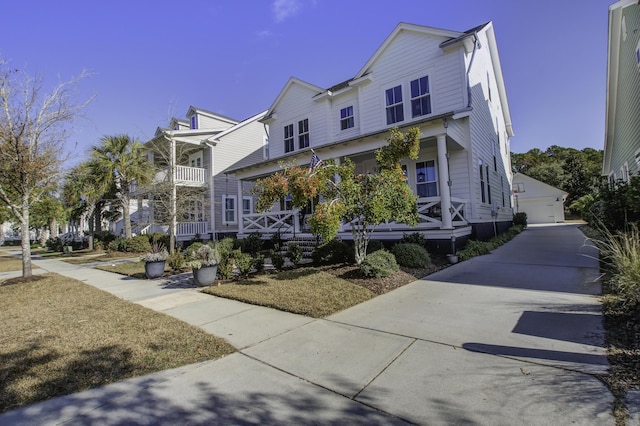 view of front of house featuring a garage and a porch