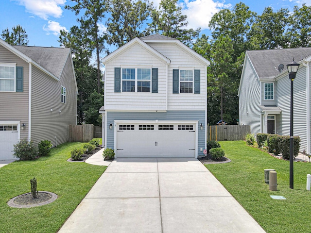 view of front facade with a garage and a front lawn