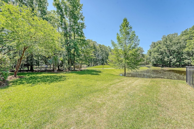 2701 Fountainhead Way, Mount Pleasant, SC 29466 - view of grassy yard featuring a water view and view of wooded area
