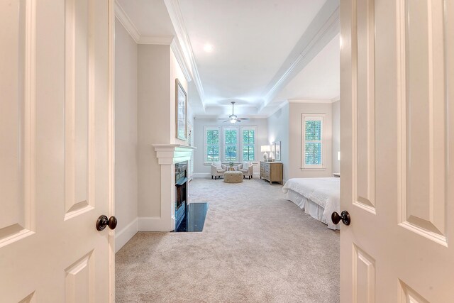 2701 Fountainhead Way, Mount Pleasant, SC 29466 - bedroom featuring carpet flooring, crown molding, a fireplace with flush hearth, and baseboards