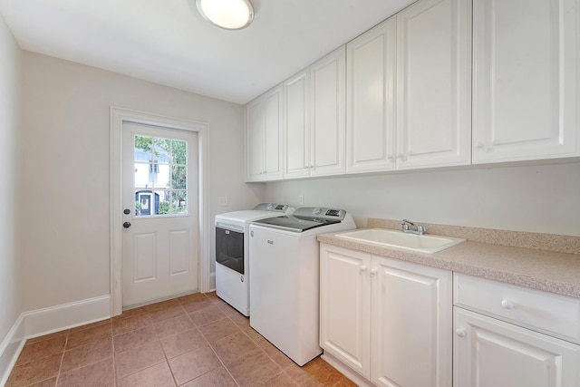 2701 Fountainhead Way, Mount Pleasant, SC 29466 - laundry room featuring washing machine and dryer, cabinet space, and baseboards