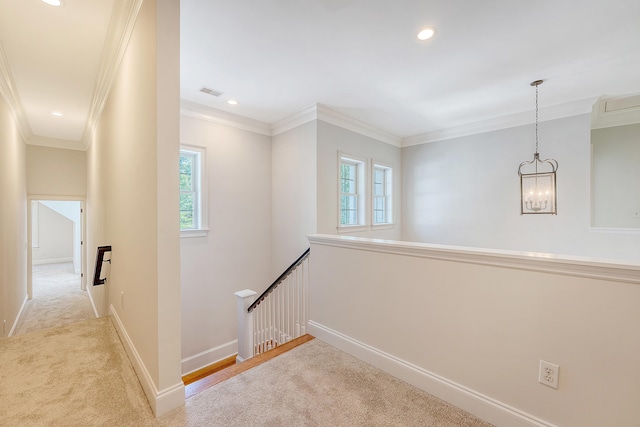 2701 Fountainhead Way, Mount Pleasant, SC 29466 - hallway with an upstairs landing, carpet, a chandelier, ornamental molding, and baseboards