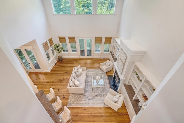 2701 Fountainhead Way, Mount Pleasant, SC 29466 - living room featuring a high ceiling, wood finished floors, and a premium fireplace