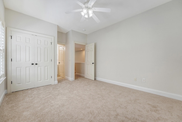 2701 Fountainhead Way, Mount Pleasant, SC 29466 - unfurnished bedroom with light colored carpet, baseboards, a closet, and ceiling fan