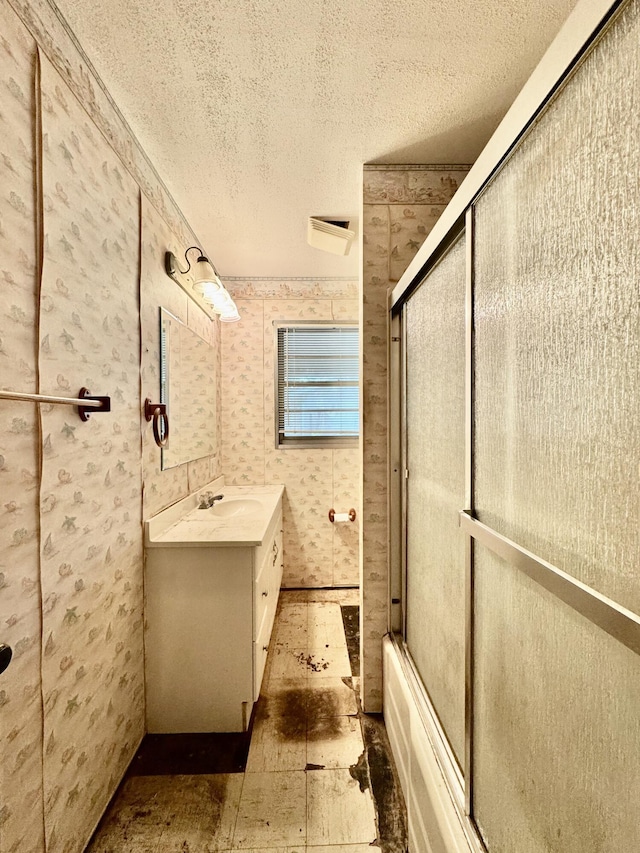 524 Kell Pl, Charleston, SC 29412 - full bathroom with a textured ceiling, vanity, enclosed tub / shower combo, and wallpapered walls